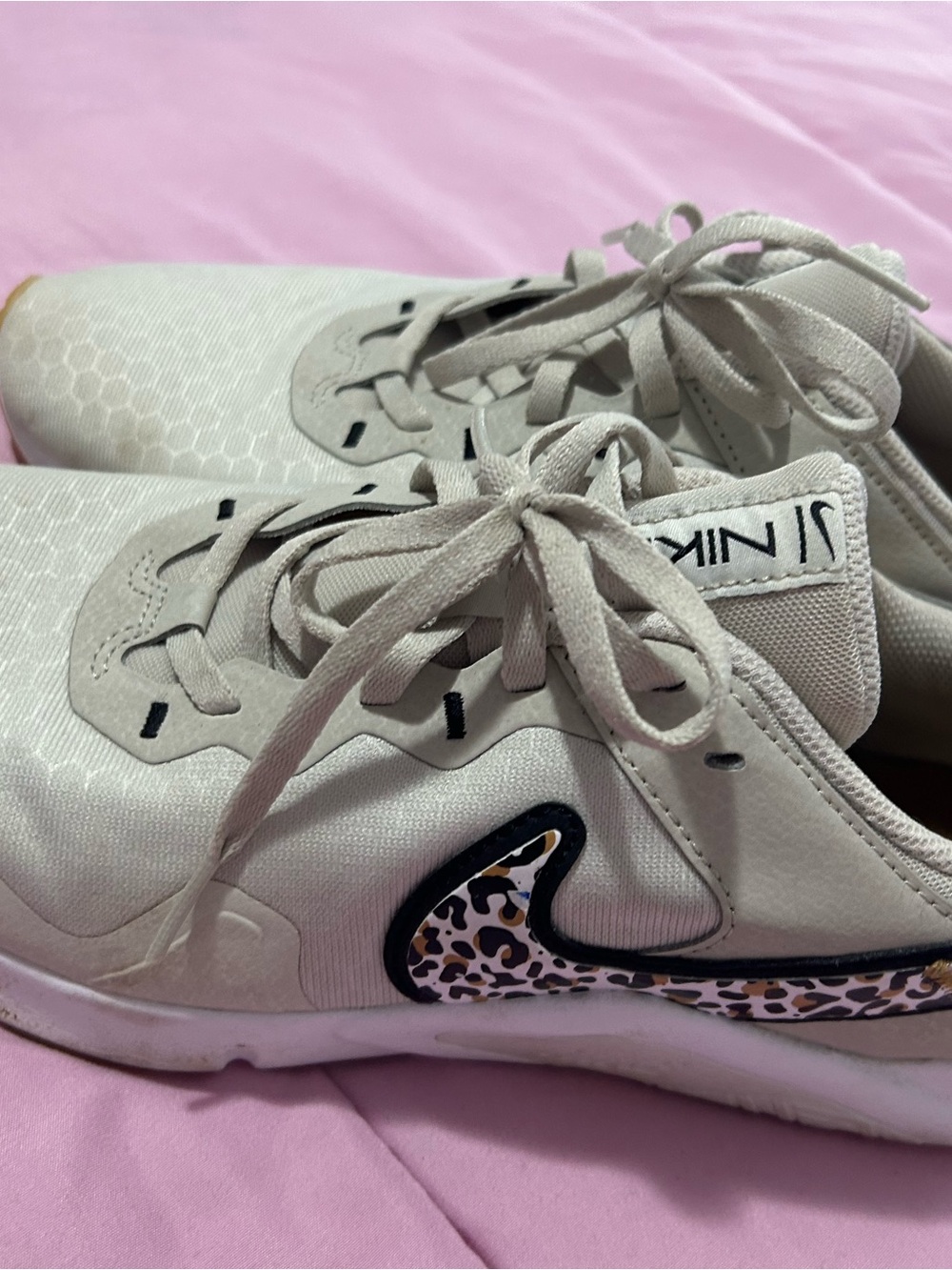 Nike Women's Beige Sneakers with Leopard Swoosh Accent